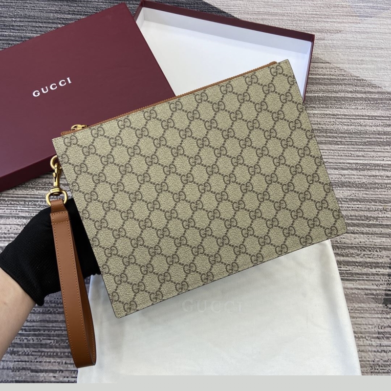 G*u*i clutch bags